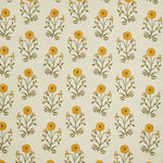 Woven fabric swatch in a painterly floral print in mustard and green on a cream field.