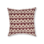 Block printed pillow with wine purple diamonds and rust brown cross hatched lines.