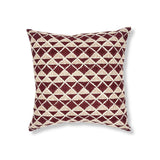 Block printed pillow with wine purple diamonds and rust brown cross hatched lines.