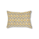 Block printed lumbar pillow with tan diamonds and navy cross hatched lines.