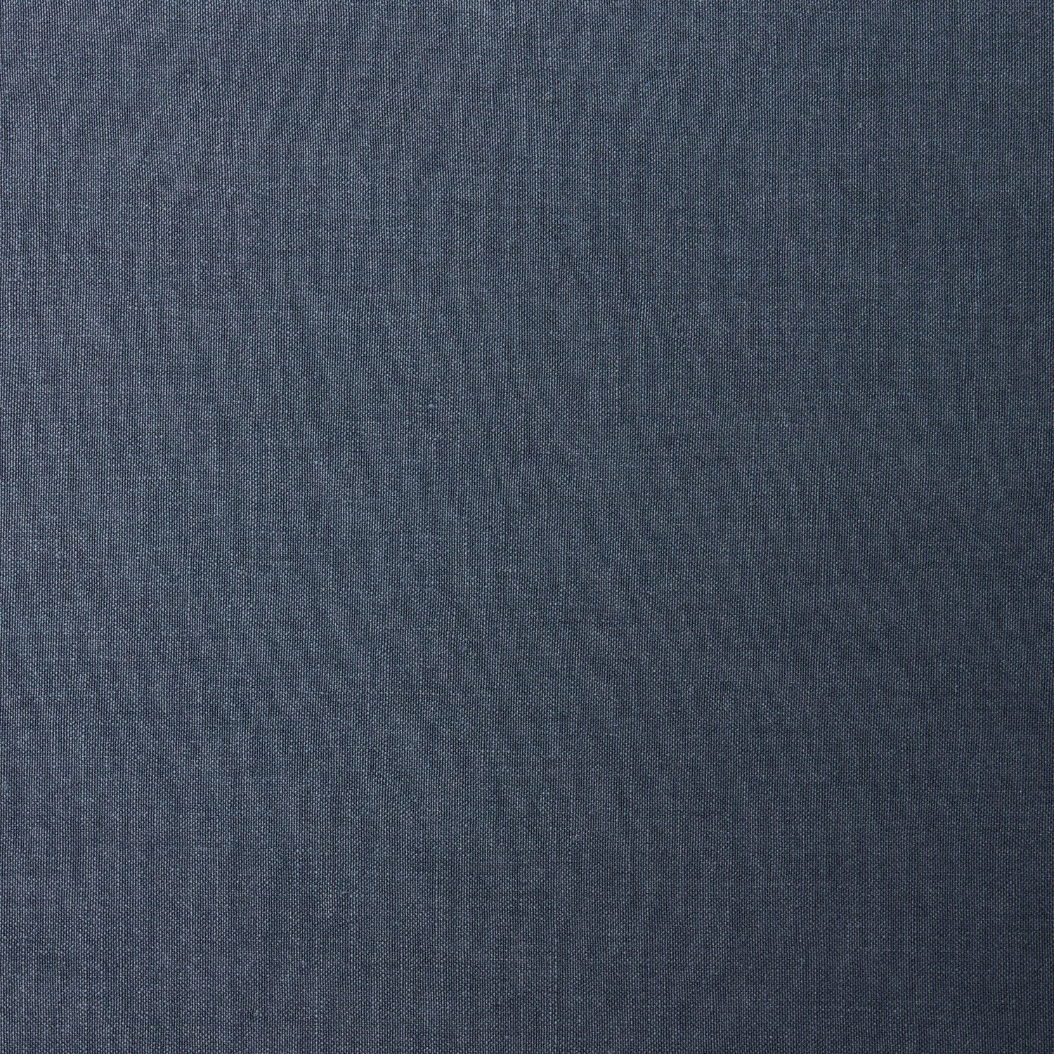 A swatch of linen fabric in a solid navy color.
