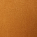 A swatch of linen fabric in a solid gold color.