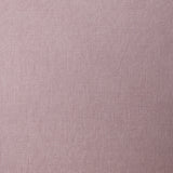A swatch of linen fabric in a solid mauve color.