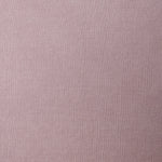A swatch of linen fabric in a solid mauve color.