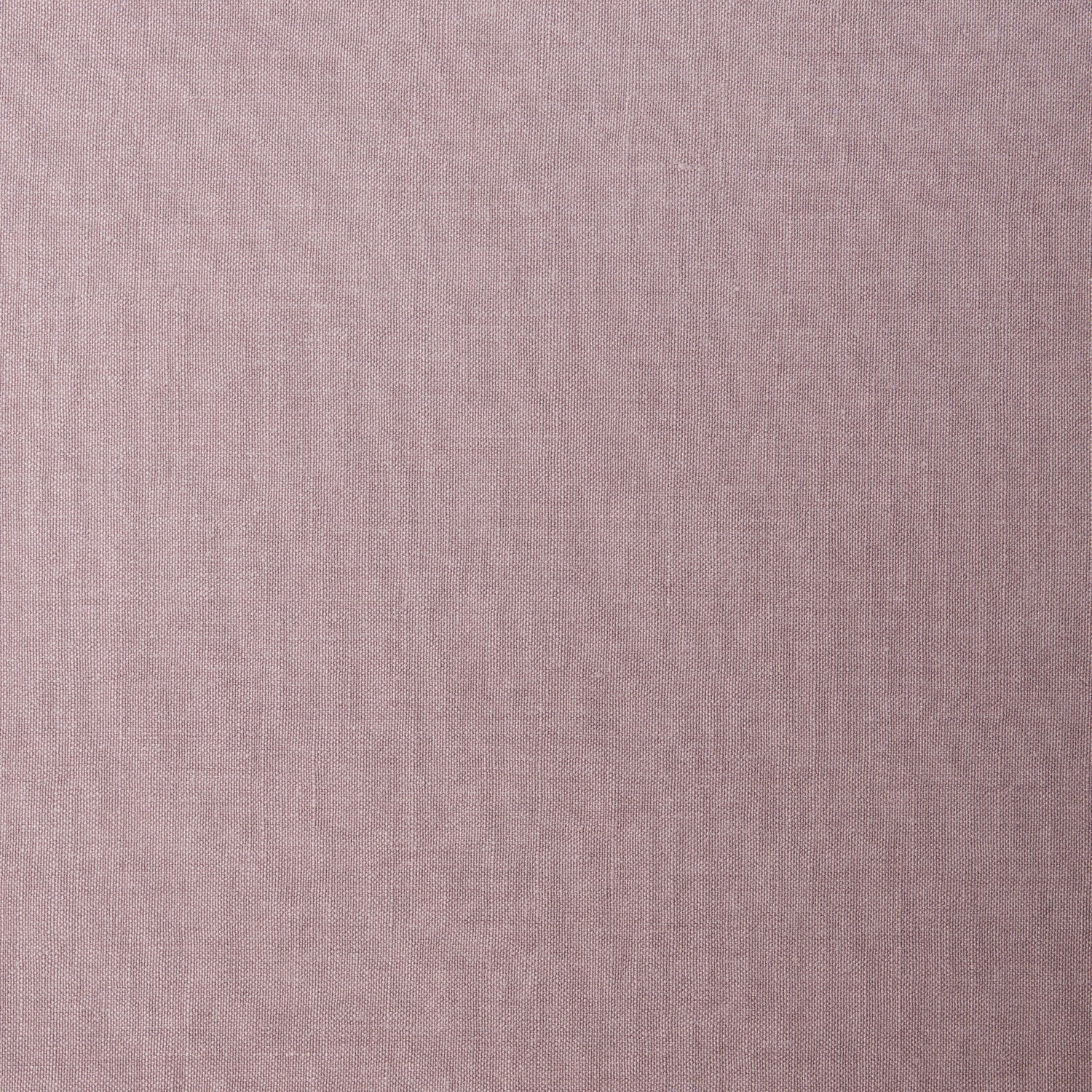 A swatch of linen fabric in a solid mauve color.