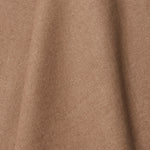 A draped swatch of linen fabric in a solid light brown color.