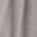 A draped swatch of linen fabric in a solid gray color.