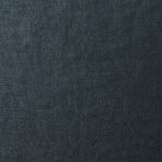 A swatch of old-world linen fabric in a solid dark green-gray color.