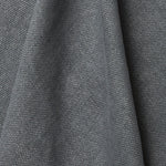 A draped swatch of old-world linen fabric in a solid dark gray color.