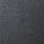 A swatch of old-world linen fabric in a solid dark gray color.