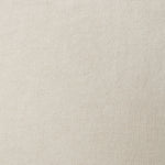 A swatch of old-world linen fabric in a solid cream color.