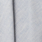 A draped swatch of blended linen fabric in a mottled light blue color.