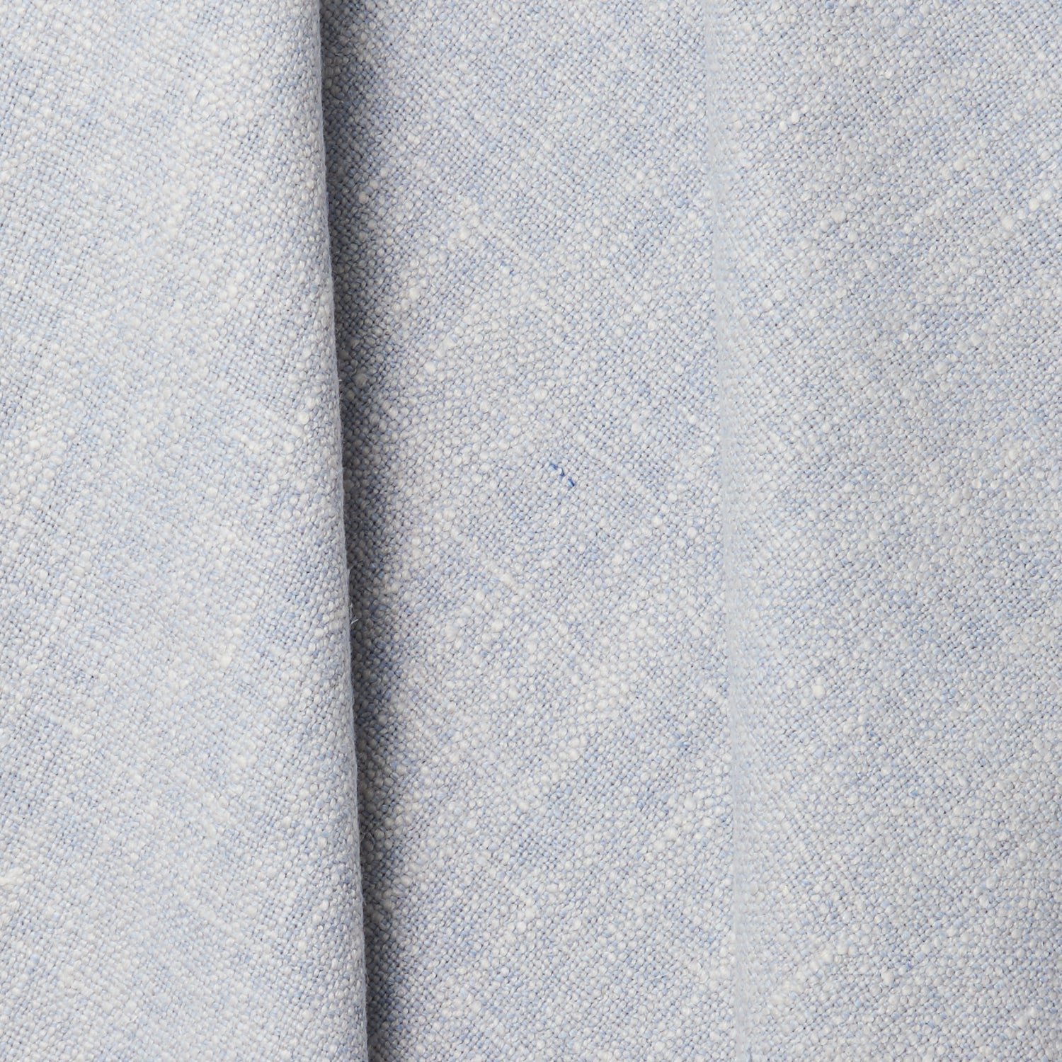 A draped swatch of blended linen fabric in a mottled light blue color.