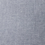 A swatch of blended linen fabric in a mottled light navy color.