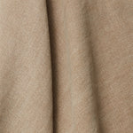 A draped swatch of blended linen fabric in a solid tan color.