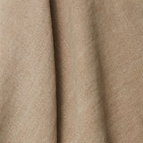 A draped swatch of blended linen fabric in a solid tan color.
