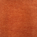 Detail of a handtufted orange rug with a subtle ribbed stripe