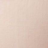 A swatch of blended linen fabric in a solid pale pink color.