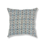 Block printed pillow with organic petal pattern in shades of blue. 