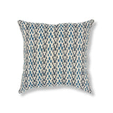 Block printed pillow with organic petal pattern in shades of blue. 