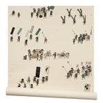 A roll of wallpaper in a design replicating 19th-century Japanese prints with a pattern of soldiers and horses carrying spears and flags.