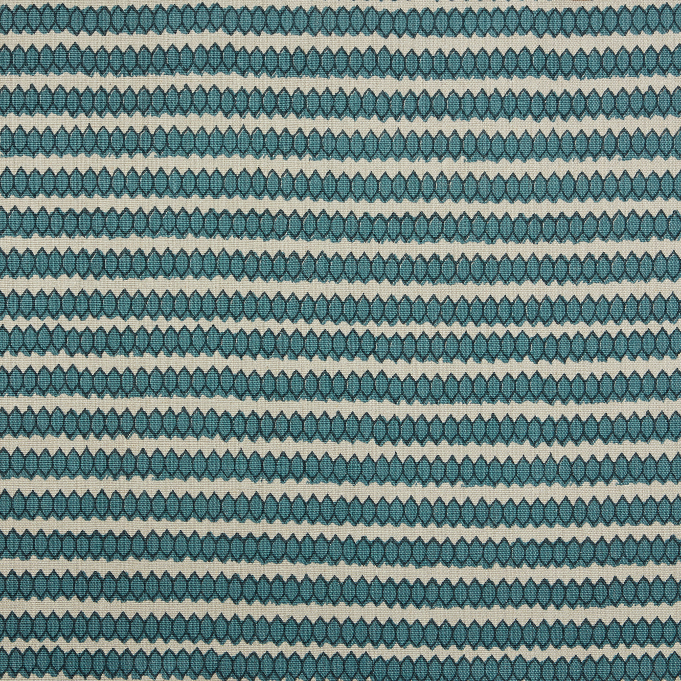 Swatch of fabric with rows of hand-drawn navy and turquoise honeycomb shapes on a cream background.
