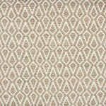 Detail of a handowven rug in an diamond like pattern in white and soft pink.
