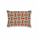 Block printed lumbar pillow with geometric mosaic design in rust red, blue and tan.