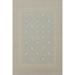 Patterned rug with geometric design on a plain background