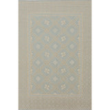 Patterned rug with geometric design on a plain background