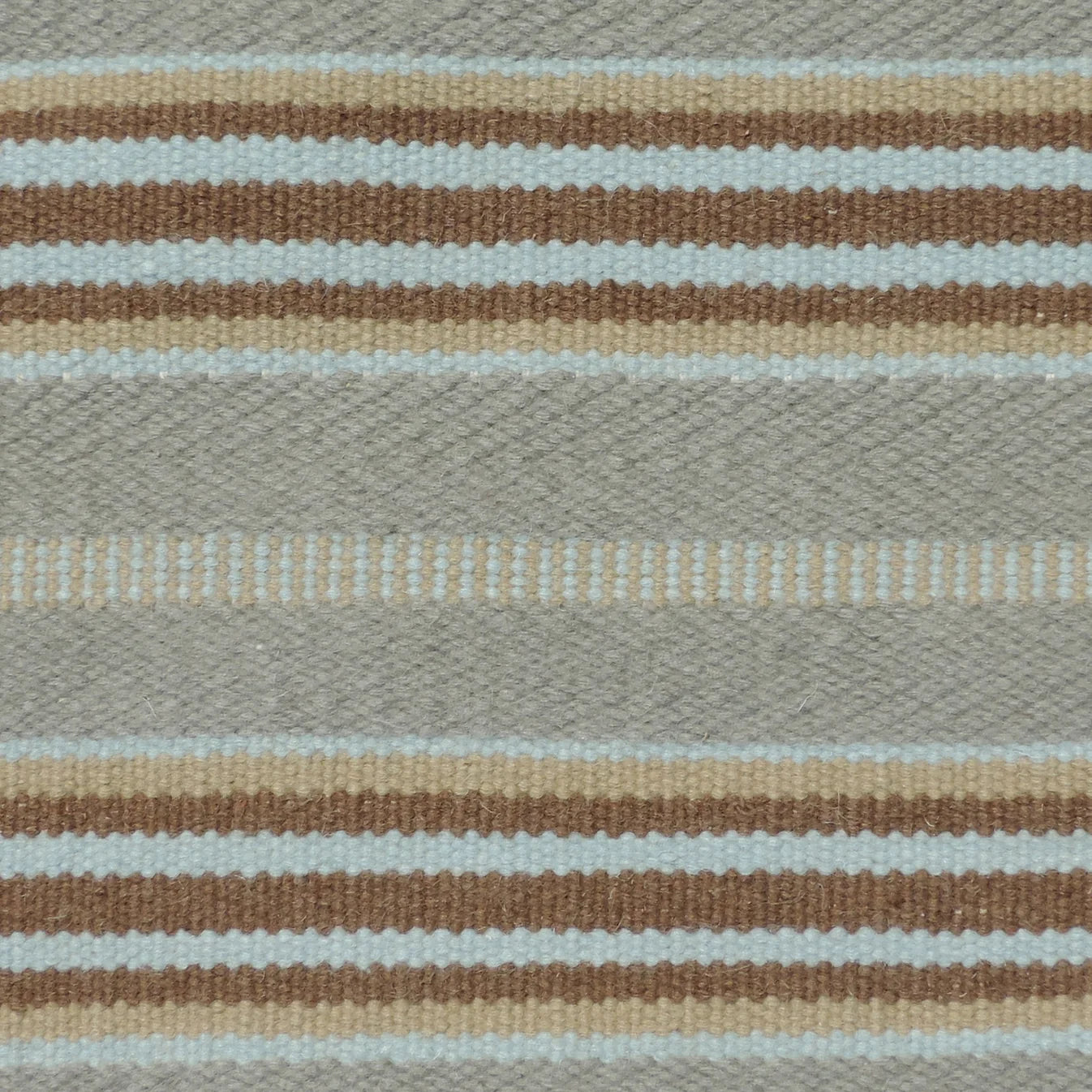 Handmade rug with stripes in grey, blue and brown.