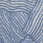 Textured carpet with wavy blue pattern on a neutral background