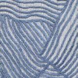 Textured carpet with wavy blue pattern on a neutral background