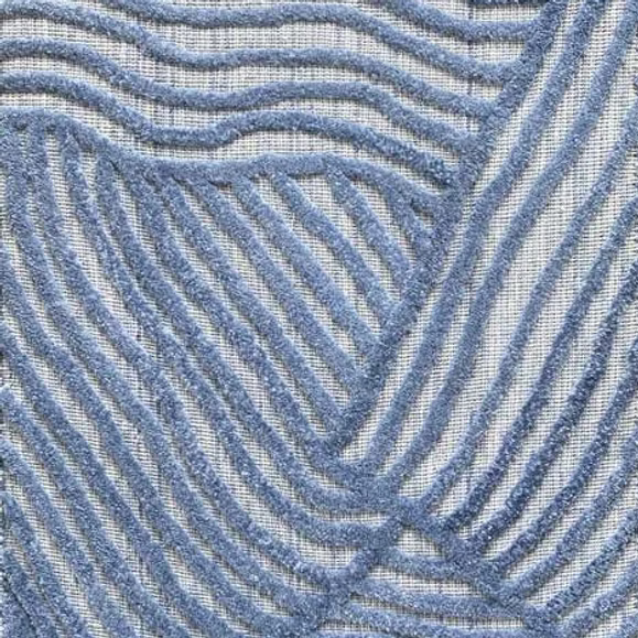 Textured carpet with wavy blue pattern on a neutral background