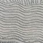 Textured carpet with wavy pattern in gray tones