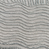 Textured carpet with wavy pattern in gray tones
