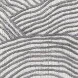 Textured carpet with wavy pattern in grey