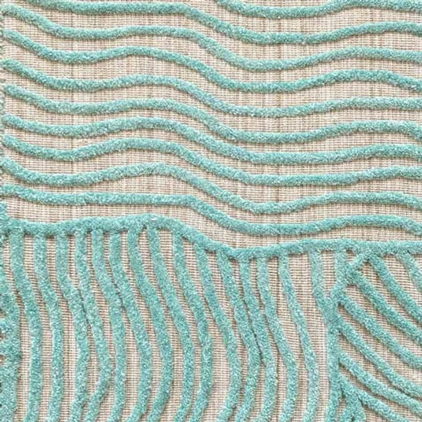 Textured carpet with wavy pattern in teal on beige background