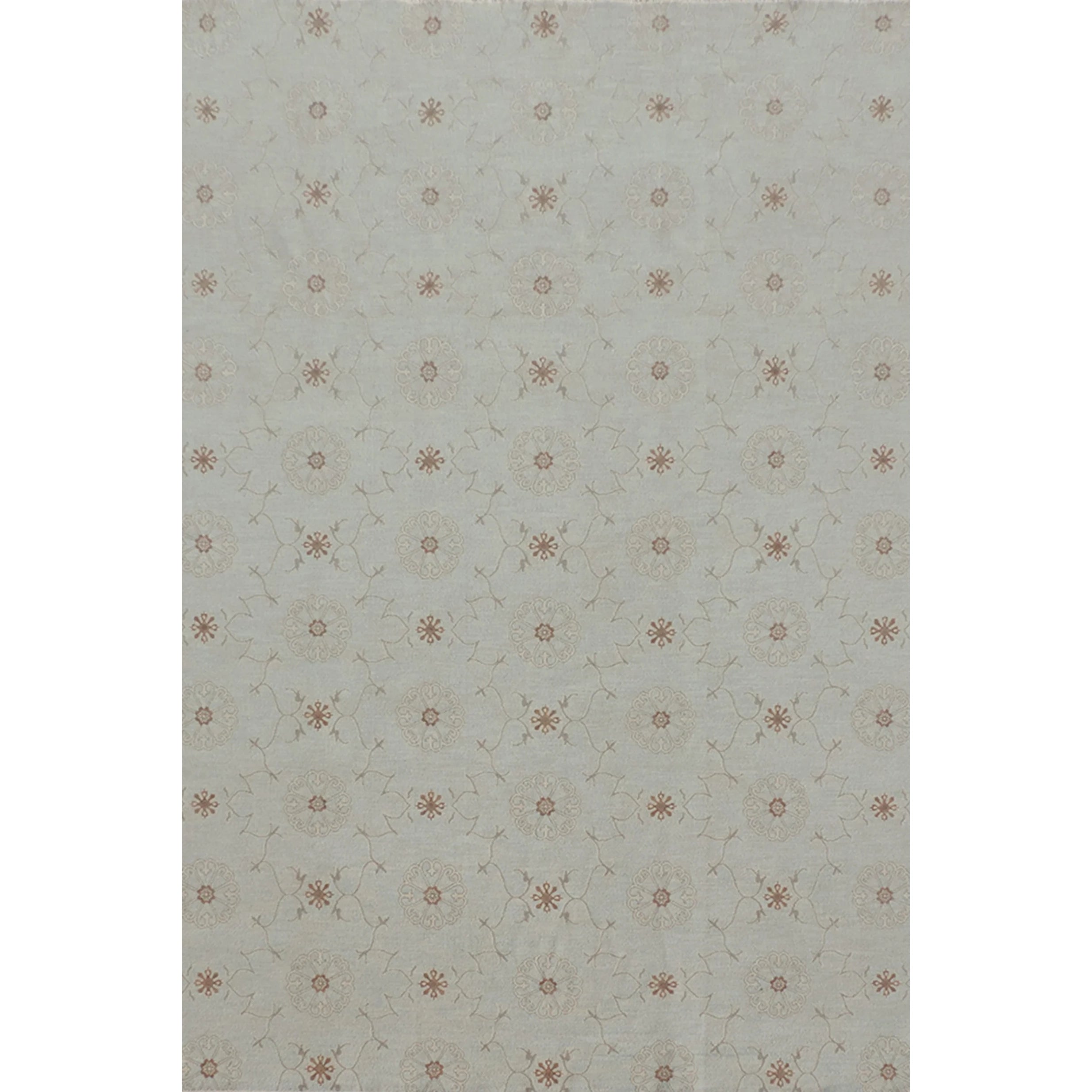 Gand woven rug in a floral filigree pattern in grey, brown and cream on a grey-blue field on white. 