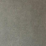 Detail of wallpaper in a muted textural print in mottled gray.