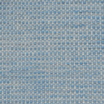 Textured handwoven carpet in light blue