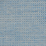 Textured handwoven carpet in light blue