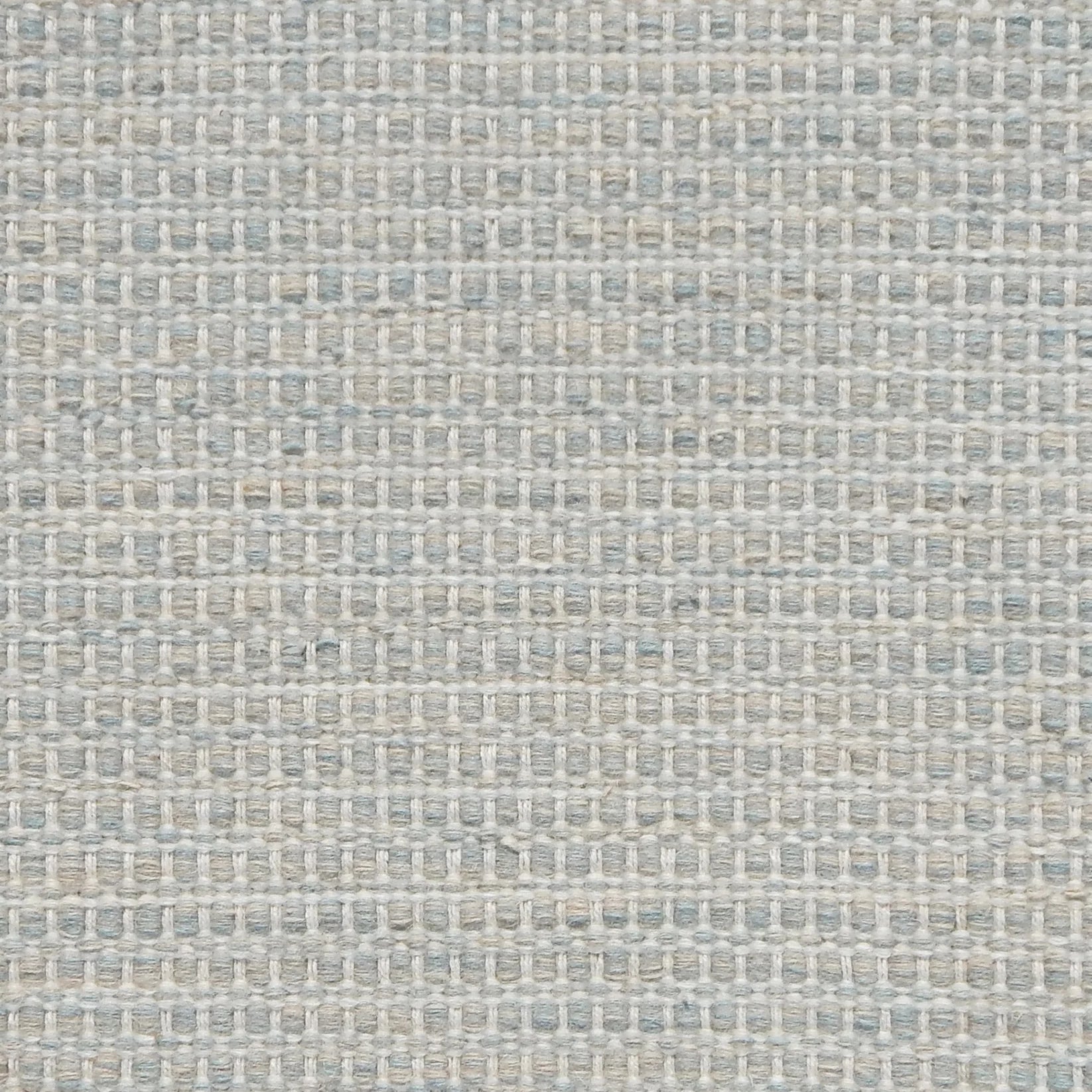 Textured handwoven carpet in grey
