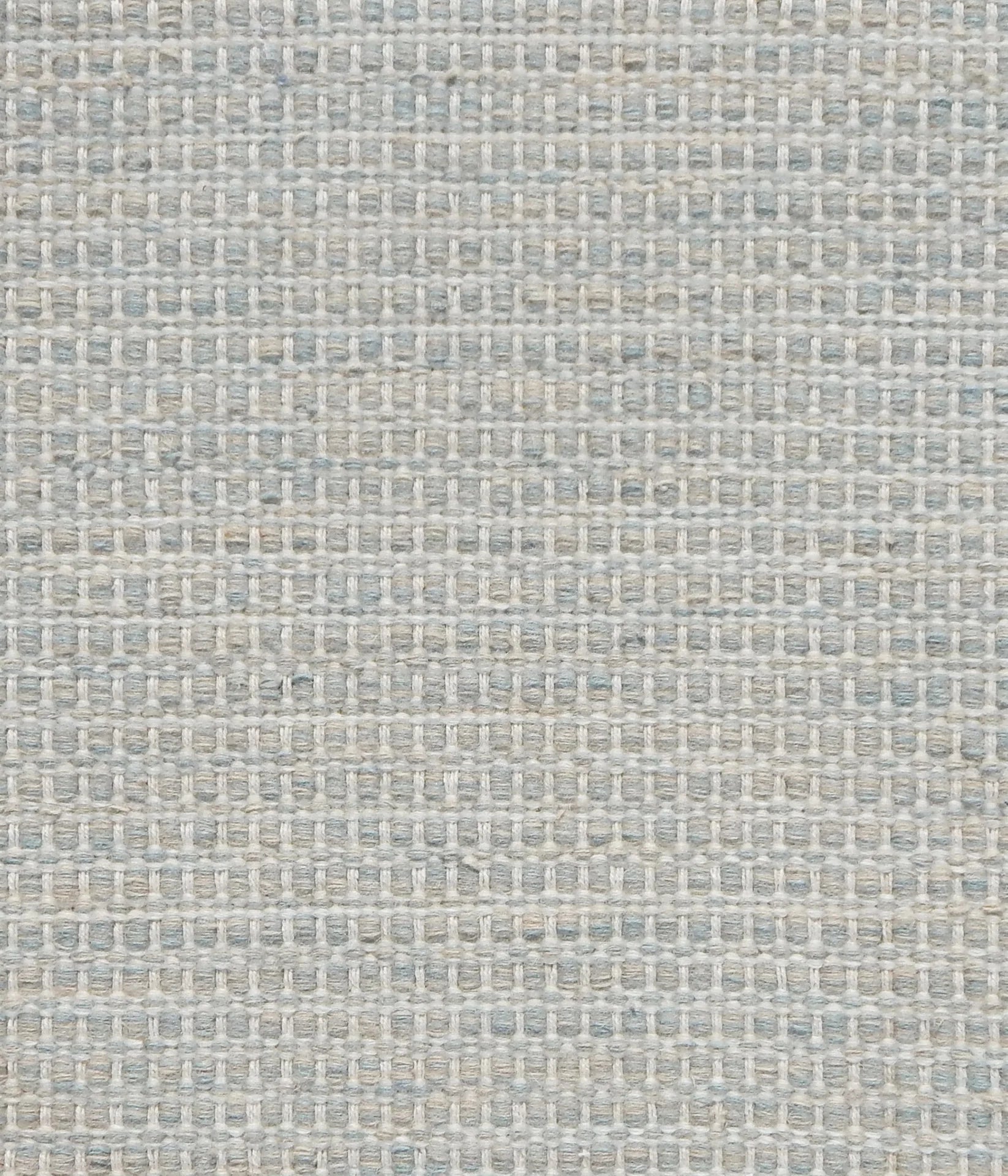 Textured handwoven carpet in grey