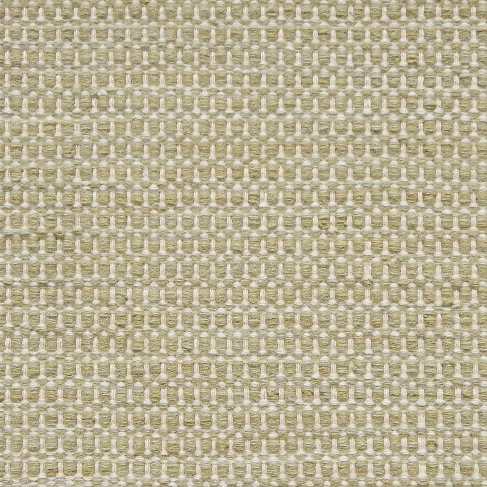 Textured handwoven carpet in pale green.