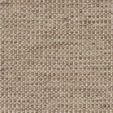 Textured handwoven carpet in light brown.
