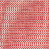 Textured handwoven carpet in bright coral red