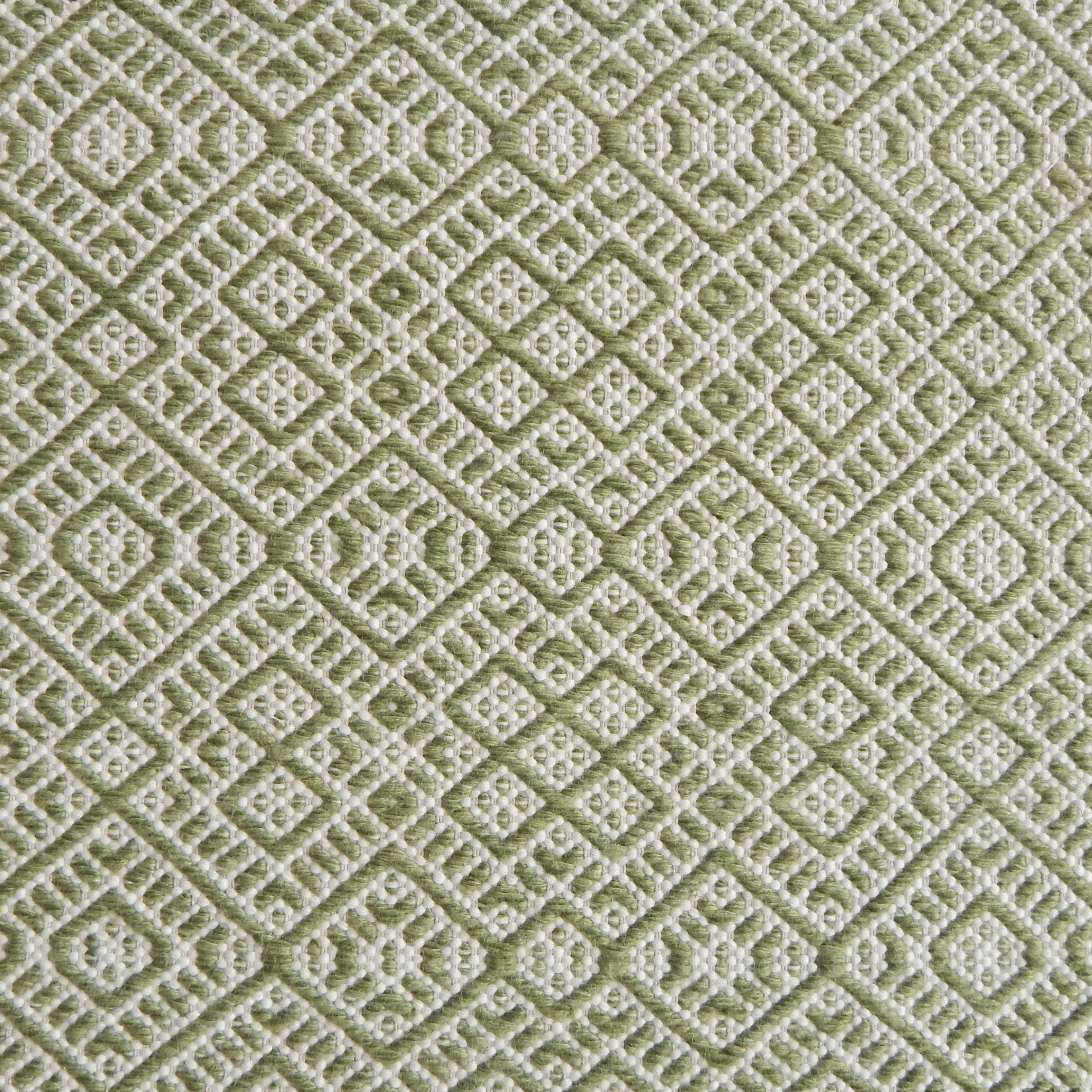 Flatweave rug with an intricate diamond pattern in white and green
