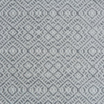 Flatweave rug with an intricate diamond pattern in white and grey