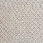 Flatweave rug with an intricate diamond pattern in white and beige. 
